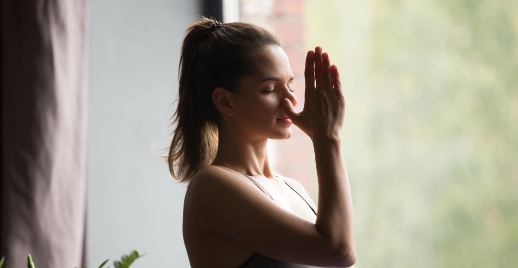 Woman-Practicing-Vaasi-Yoga